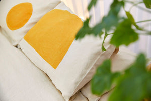 Turmeric Half Moon Pillowcase on Natural Linen